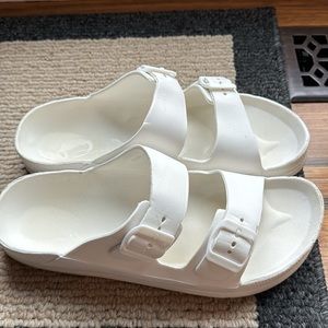 Men’s white buckle slides